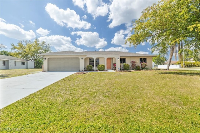 ranch-style house featuring concrete driveway, a front lawn, an attached garage, and stucco siding