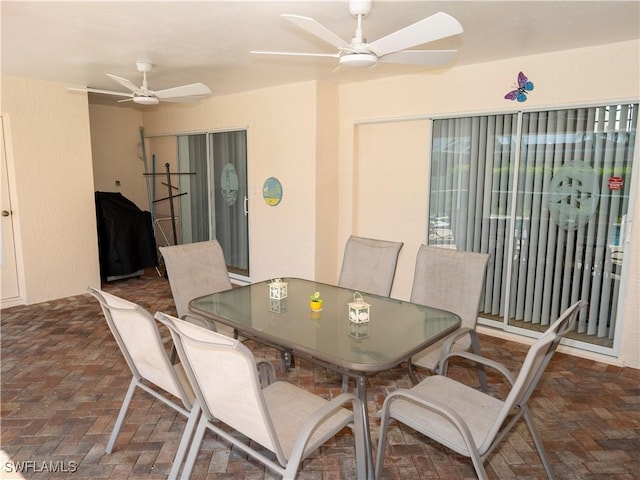 1822 SE 20th St, Cape Coral, FL 33990 - dining space featuring brick floor and a ceiling fan