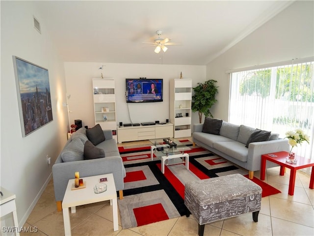 1822 SE 20th St, Cape Coral, FL 33990 - living area with lofted ceiling, tile patterned flooring, visible vents, and ceiling fan