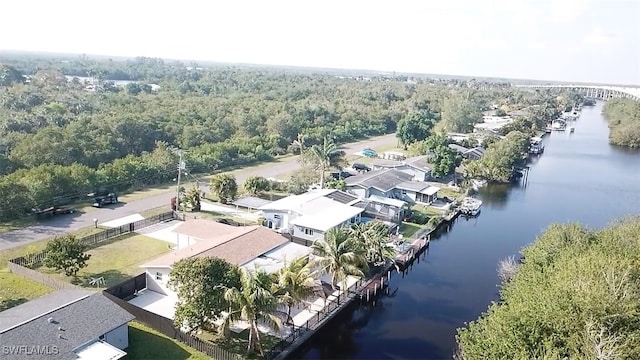 birds eye view of property with a residential view and a water view