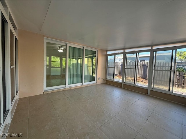 unfurnished sunroom with a healthy amount of sunlight