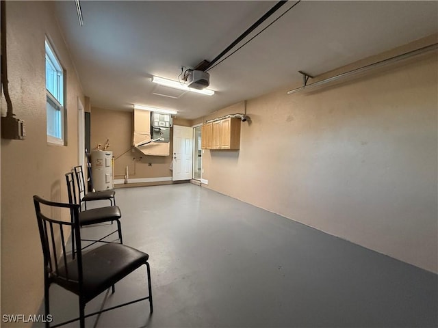 garage featuring heating unit, a garage door opener, and water heater