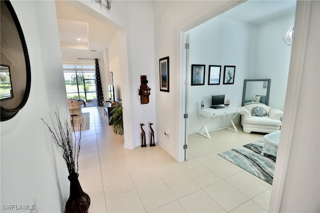 hallway with light tile patterned flooring