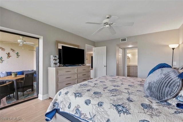 bedroom featuring baseboards, visible vents, ceiling fan, light wood-type flooring, and connected bathroom