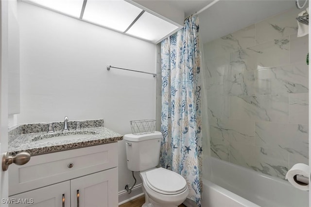 bathroom featuring toilet, vanity, and shower / bath combination with curtain