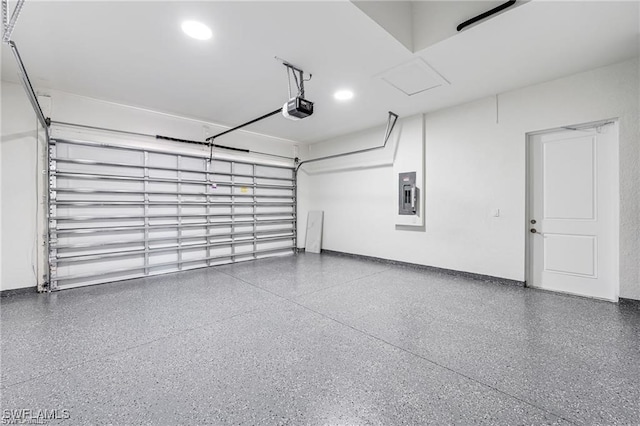 garage with baseboards, recessed lighting, electric panel, and a garage door opener