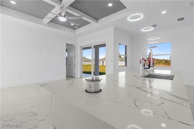 interior space with plenty of natural light, visible vents, coffered ceiling, marble finish floor, and recessed lighting