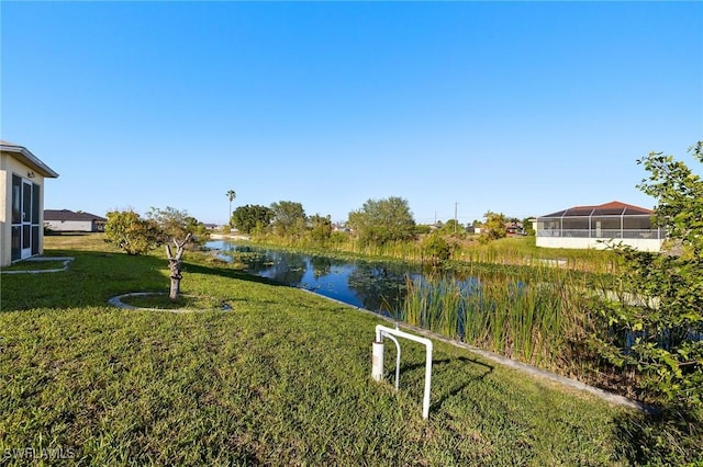 view of yard with a water view