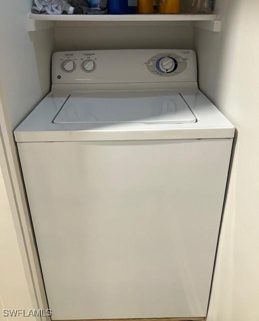 laundry room with laundry area and washer / dryer