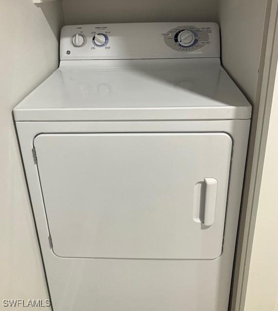 laundry room with washer / dryer and laundry area