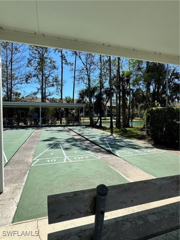 view of community featuring shuffleboard