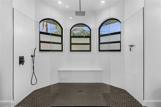 bathroom featuring recessed lighting and walk in shower