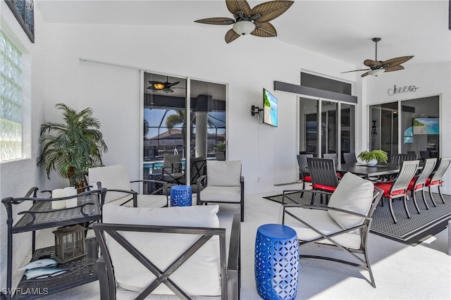 view of patio with ceiling fan, an outdoor hangout area, and outdoor dining space