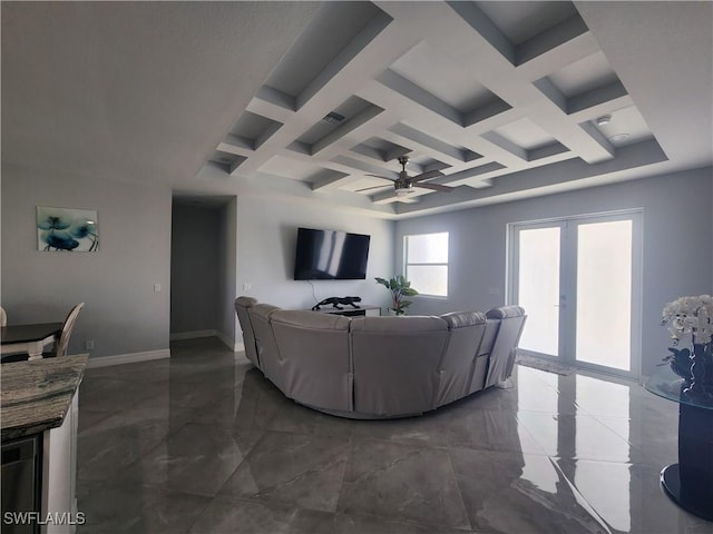 living area featuring baseboards, beam ceiling, french doors, marble finish floor, and coffered ceiling