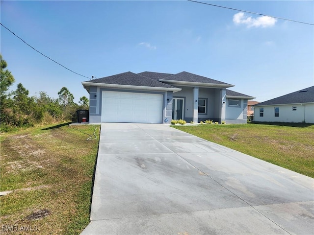 view of front of property featuring stucco siding, an attached garage, concrete driveway, and a front yard