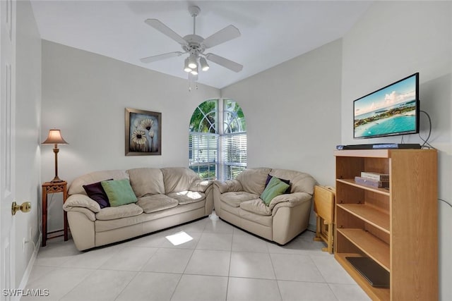 living room with light tile patterned floors and a ceiling fan