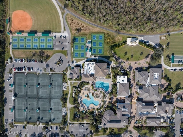 birds eye view of property with a residential view