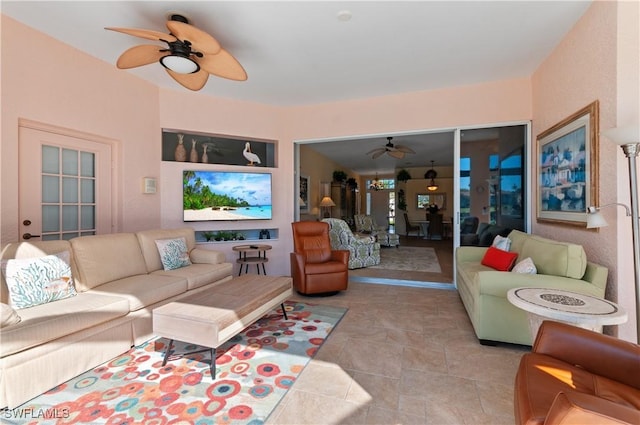 living room with ceiling fan