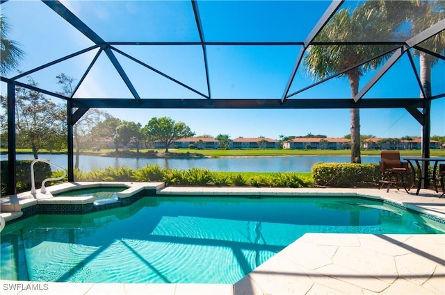 view of swimming pool with glass enclosure, a patio, a water view, and a pool with connected hot tub