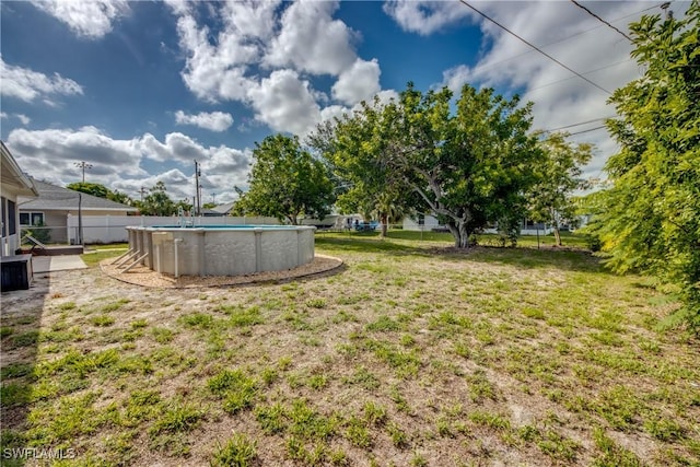 618 SE 26th St, Cape Coral, FL 33904 - view of yard with an outdoor pool