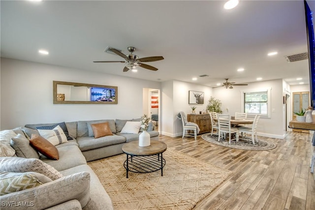 618 SE 26th St, Cape Coral, FL 33904 - living area with a ceiling fan, baseboards, light wood-style flooring, and recessed lighting