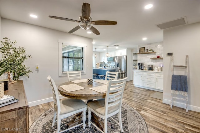 618 SE 26th St, Cape Coral, FL 33904 - dining area with light wood-style floors, recessed lighting, a ceiling fan, baseboards, and attic access