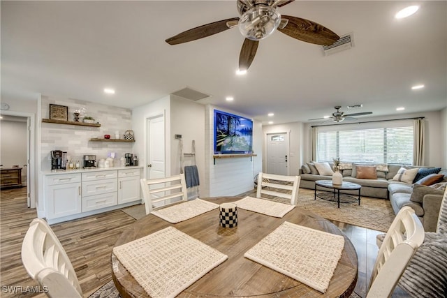 618 SE 26th St, Cape Coral, FL 33904 - living room with a ceiling fan, light wood-type flooring, and recessed lighting