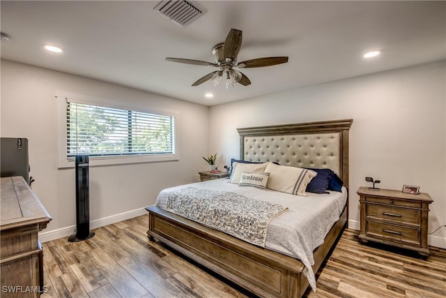618 SE 26th St, Cape Coral, FL 33904 - bedroom featuring wood finished floors, recessed lighting, baseboards, and a ceiling fan