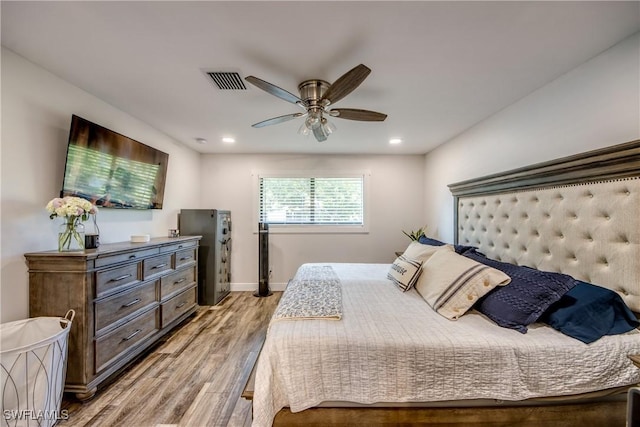 618 SE 26th St, Cape Coral, FL 33904 - bedroom with light wood-style floors, recessed lighting, baseboards, and ceiling fan
