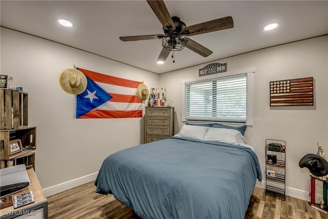 618 SE 26th St, Cape Coral, FL 33904 - bedroom featuring baseboards, wood finished floors, recessed lighting, and a ceiling fan