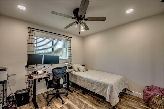 618 SE 26th St, Cape Coral, FL 33904 - bedroom featuring wood finished floors, baseboards, recessed lighting, ceiling fan, and a desk