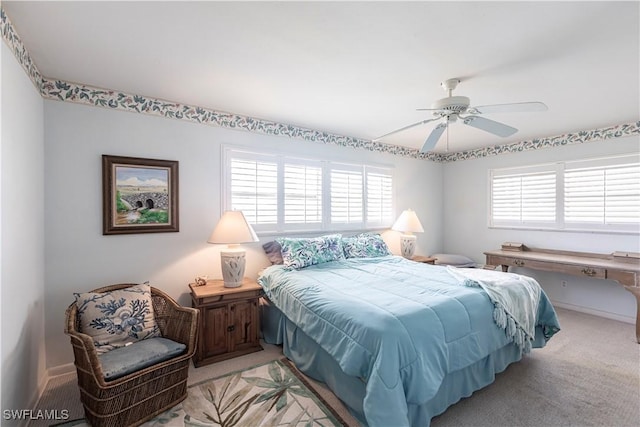 bedroom featuring carpet flooring and a ceiling fan