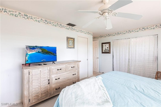 bedroom with visible vents and ceiling fan