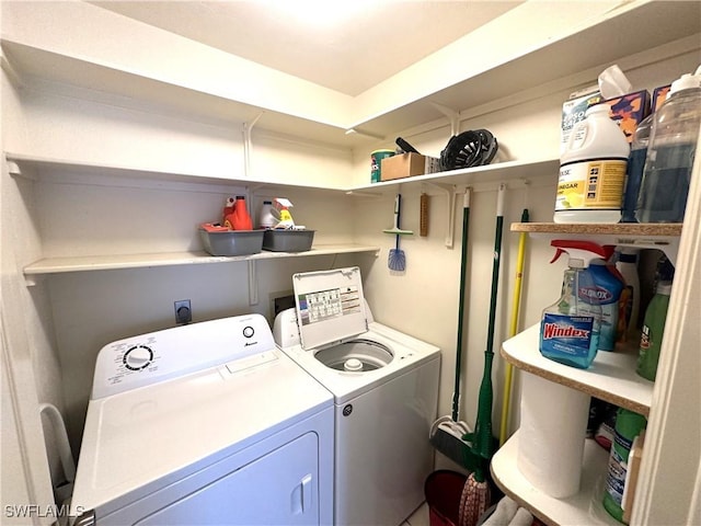 laundry area featuring laundry area and washing machine and clothes dryer