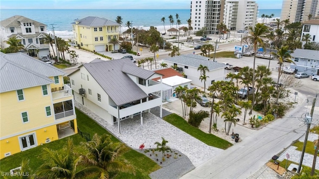 birds eye view of property featuring a residential view and a water view