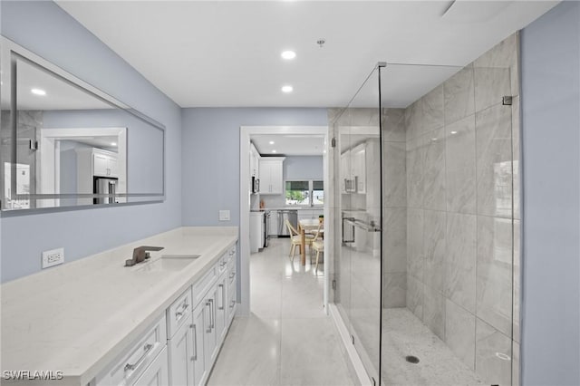 full bath featuring vanity, recessed lighting, and a stall shower