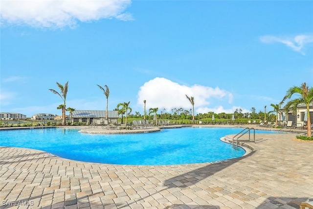 pool featuring a patio area