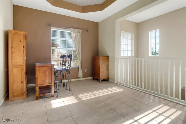 17498 Old Harmony Dr Unit 202, Fort Myers, FL 33908 - home office with plenty of natural light, light tile patterned flooring, and baseboards