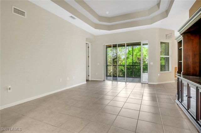 17498 Old Harmony Dr Unit 202, Fort Myers, FL 33908 - spare room with a wealth of natural light, visible vents, and light tile patterned flooring