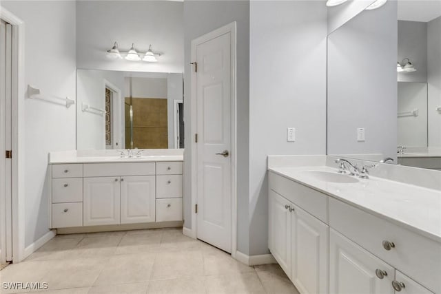 17498 Old Harmony Dr Unit 202, Fort Myers, FL 33908 - full bathroom featuring a sink, two vanities, and tile patterned flooring
