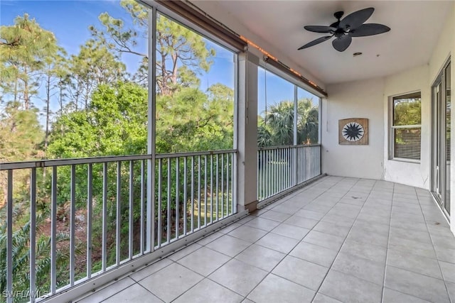 17498 Old Harmony Dr Unit 202, Fort Myers, FL 33908 - unfurnished sunroom featuring a healthy amount of sunlight and a ceiling fan