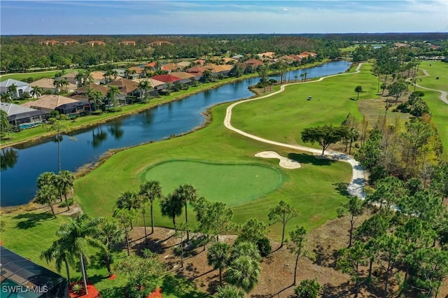 bird's eye view with a residential view, a water view, and golf course view