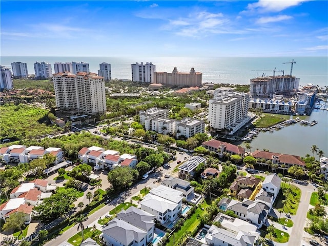 aerial view featuring a water view and a city view