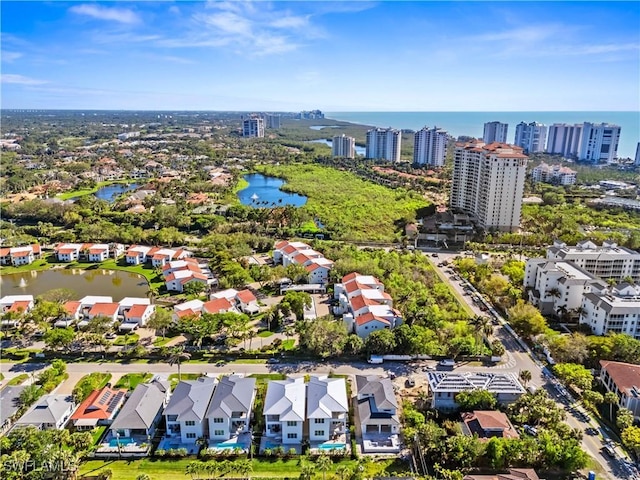 bird's eye view with a water view and a view of city