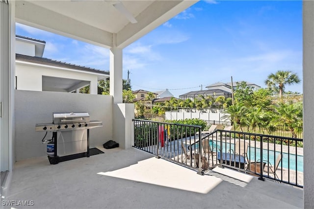 balcony featuring a grill and a patio