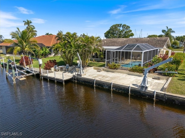 dock area featuring a water view, a lanai, boat lift, an outdoor pool, and a patio