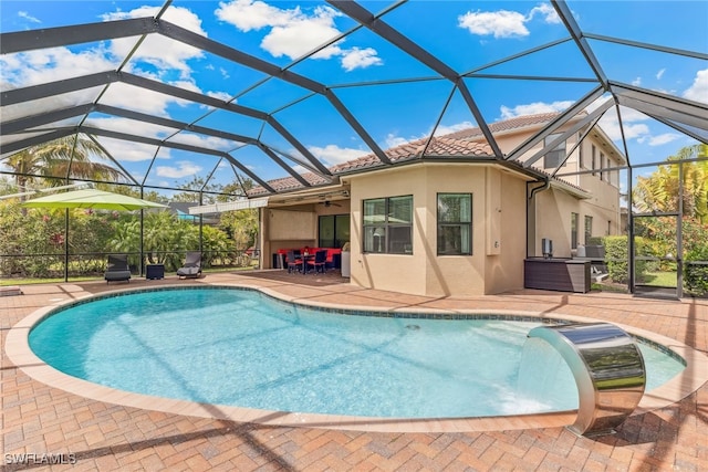 4360 Aurora St, Naples, FL 34119 - outdoor pool with a patio area, ceiling fan, and glass enclosure