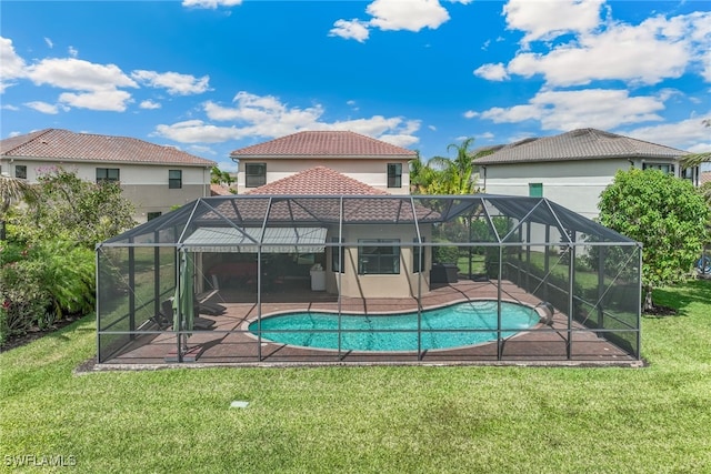 4360 Aurora St, Naples, FL 34119 - outdoor pool with glass enclosure, a patio, and a lawn