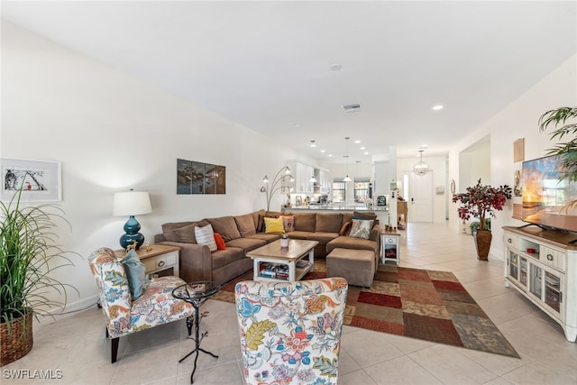4360 Aurora St, Naples, FL 34119 - living area featuring light tile patterned floors and recessed lighting