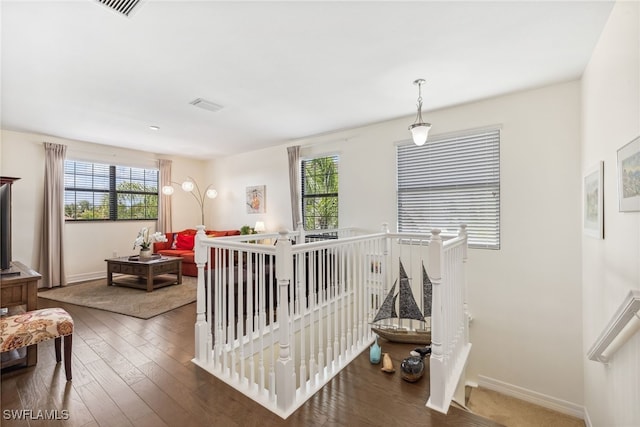 4360 Aurora St, Naples, FL 34119 - stairway with plenty of natural light and wood-type flooring